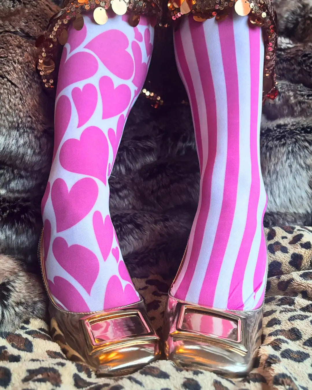 a soft pink fabric roll with parisian-themed pattern featuring scooters coffee cups and the eiffel tower for better tights