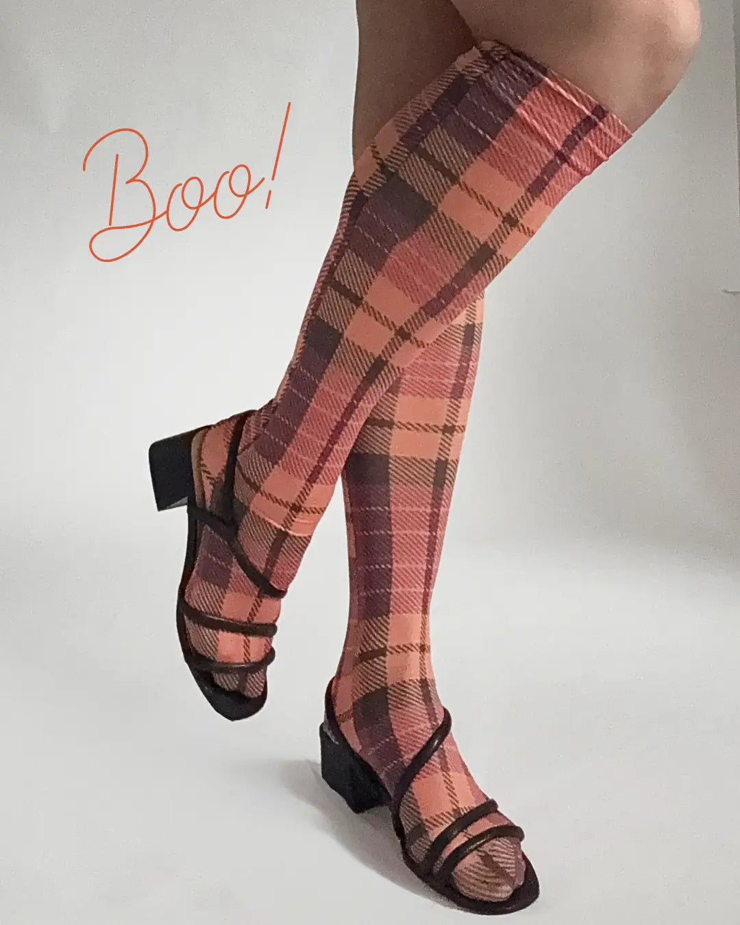 a soft pink fabric roll with parisian-themed pattern featuring scooters coffee cups and the eiffel tower for better tights