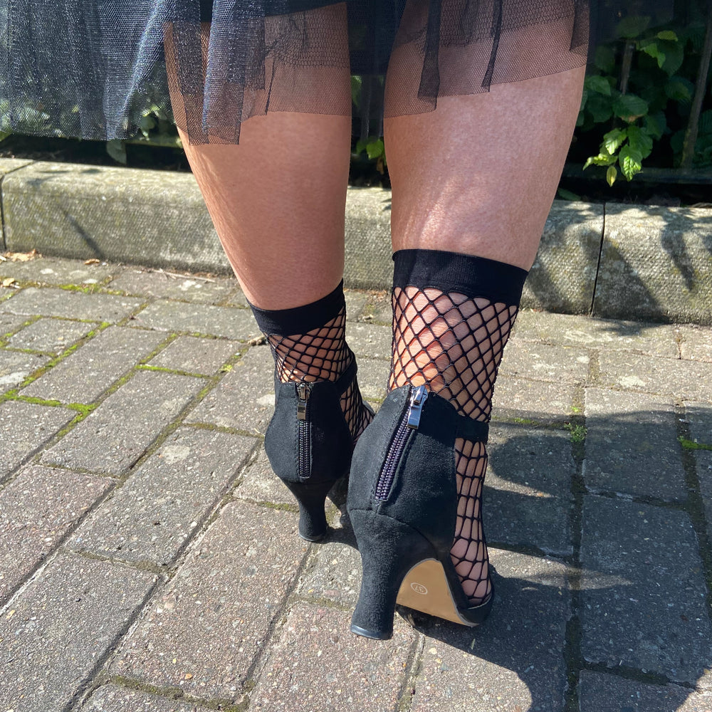 
                  
                    black fishnet socks
                  
                