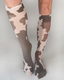 Brown and beige cow camo knee high socks featuring a playful cow print pattern for stylish everyday wear