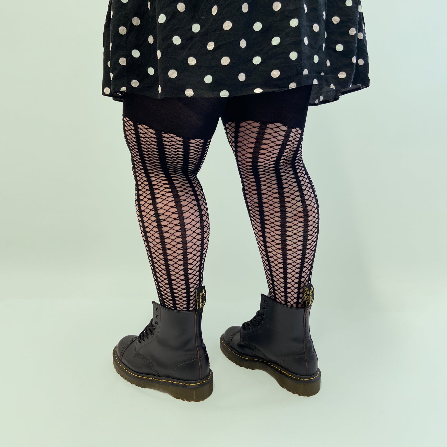 
                  
                    Stripe net tights black styled 
                  
                