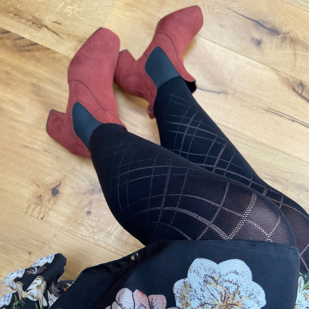 
                  
                    Black lattice tights
                  
                