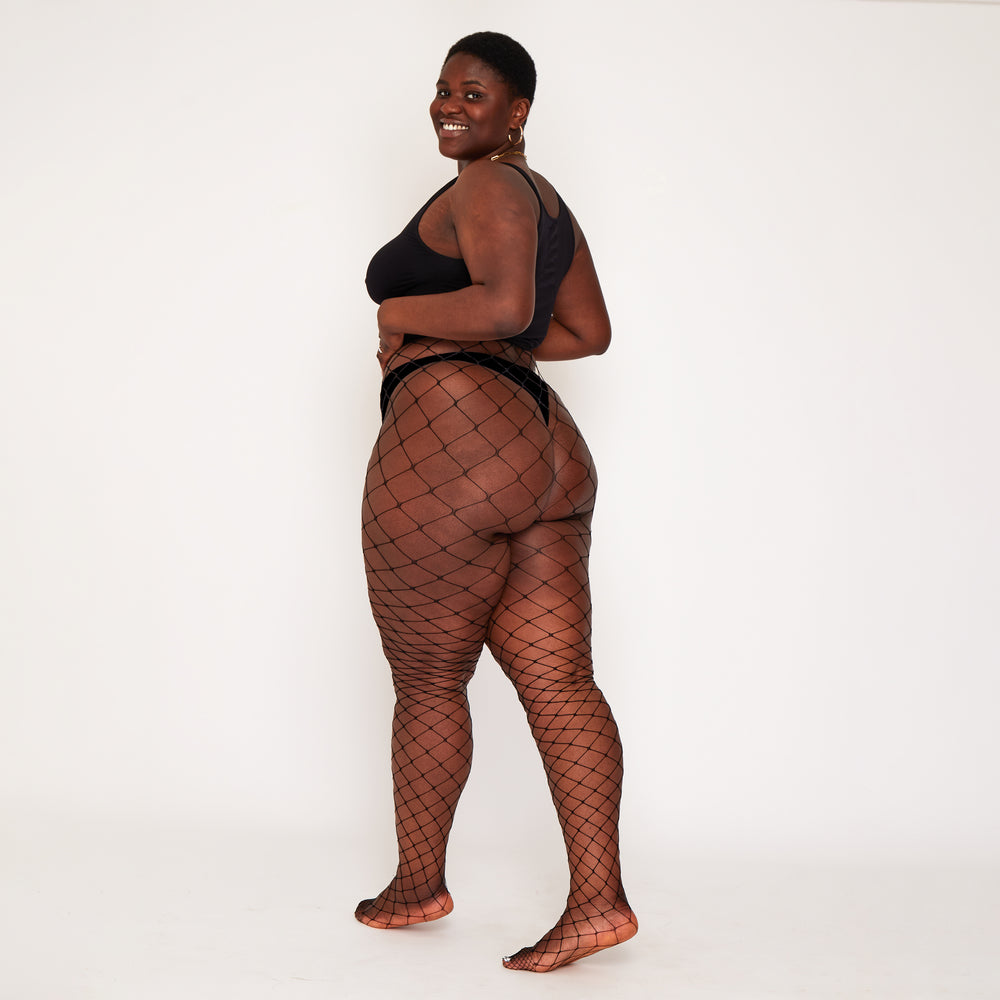 
                  
                    Large Fishnet Tights in Black
                  
                