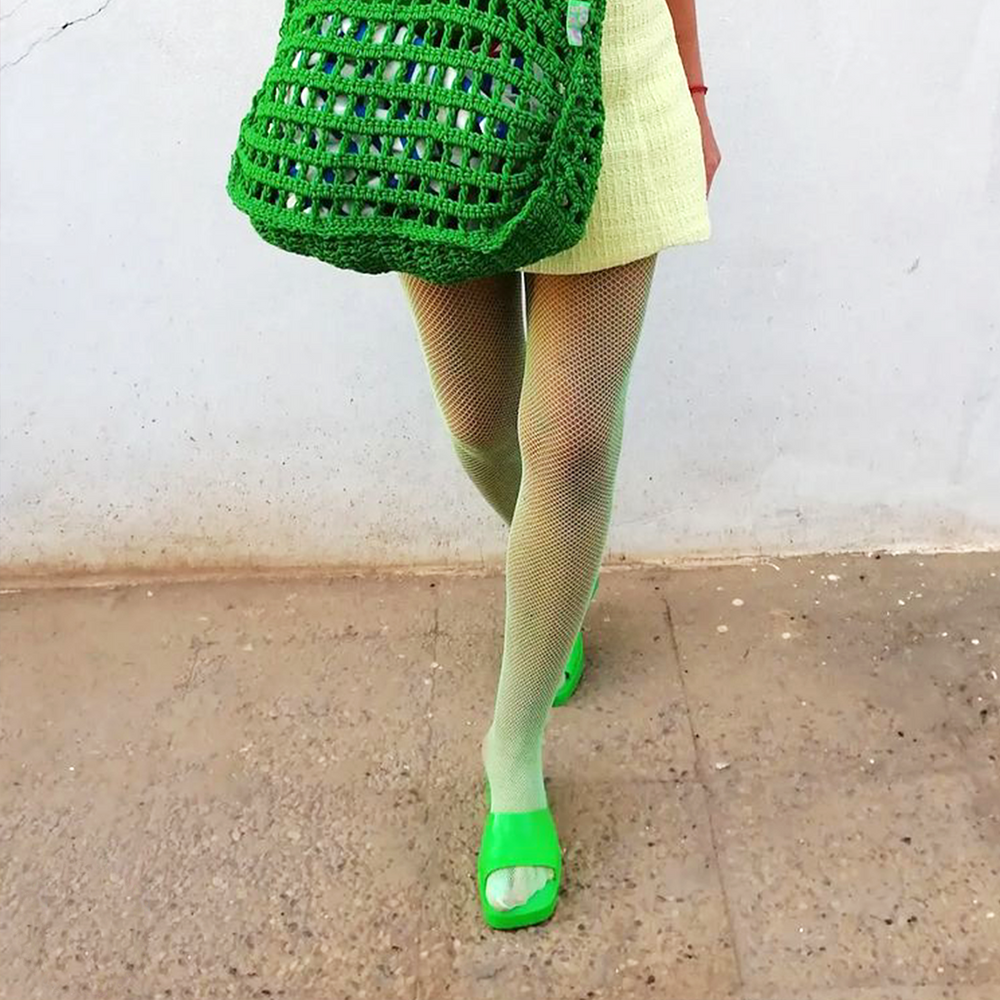 
                  
                    Fishnet Tights in Flo Green 
                  
                