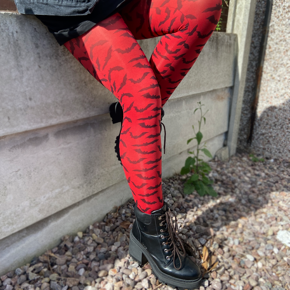 
                  
                    Red bat printed tights 
                  
                