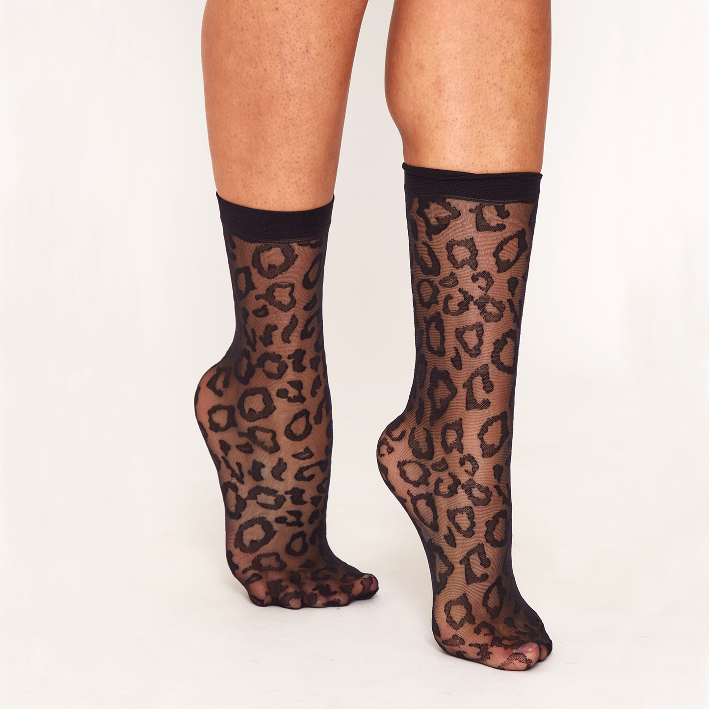 Sheer black ankle socks with leopard print 